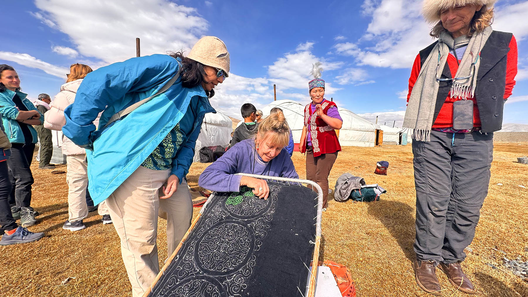 Guests sharing cultural moment with Kazakh eagle hunters