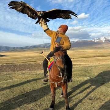 Juan holding the eagle